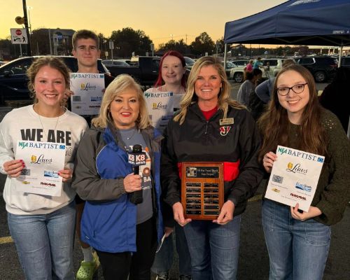  JHS Ambassadors and HHS counselor Mrs. Stewart stand with Diana Davis accepting award for top donor